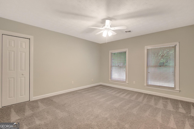 40 Springwater Chase, Newnan, GA 30265 - carpeted empty room with baseboards and ceiling fan