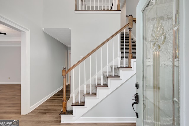 40 Springwater Chase, Newnan, GA 30265 - stairs with crown molding and wood finished floors