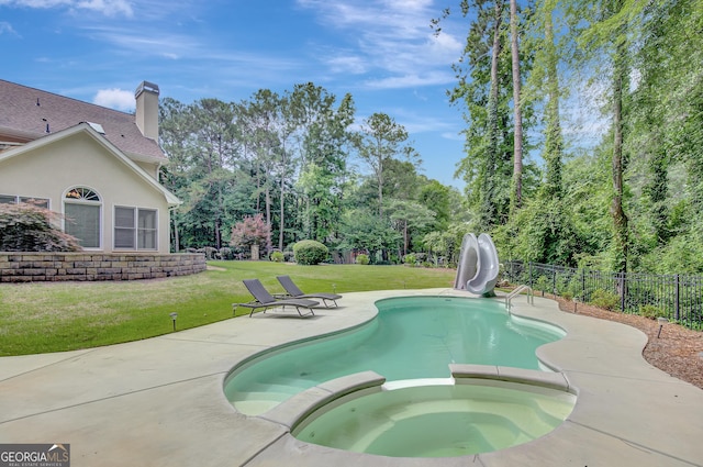 40 Springwater Chase, Newnan, GA 30265 - view of pool with a water slide, a patio area, a pool with connected hot tub, and view of scattered trees