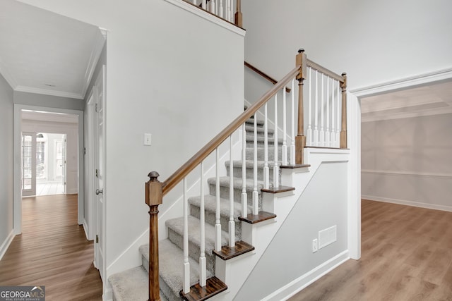40 Springwater Chase, Newnan, GA 30265 - stairway featuring wood finished floors and ornamental molding