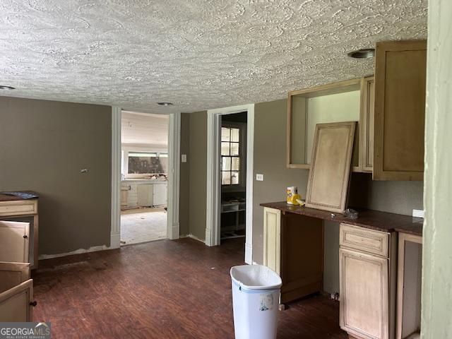 680 Thomas Rd, Trion, GA 30753 - kitchen featuring dark wood-style floors, a textured ceiling, and dark countertops