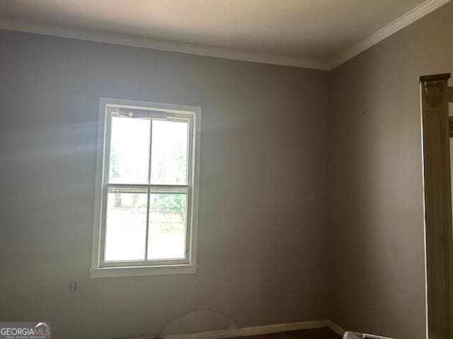 680 Thomas Rd, Trion, GA 30753 - empty room featuring healthy amount of natural light and ornamental molding