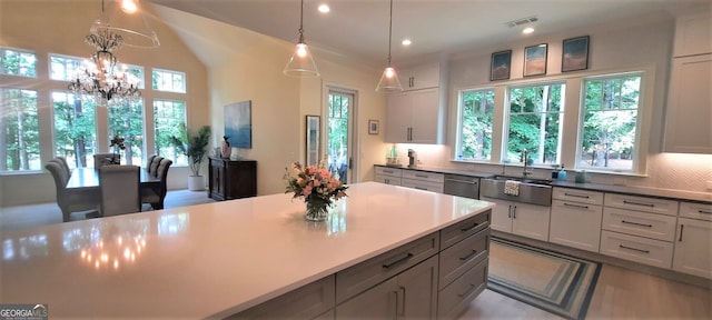 1330 Jackson Ridge Rd, Greensboro, GA 30642 - kitchen with a chandelier, recessed lighting, decorative backsplash, decorative light fixtures, and dishwasher