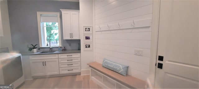 1330 Jackson Ridge Rd, Greensboro, GA 30642 - kitchen featuring white cabinets and wood finished floors