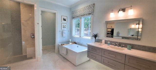 1330 Jackson Ridge Rd, Greensboro, GA 30642 - bathroom featuring vanity, a freestanding tub, decorative backsplash, and crown molding