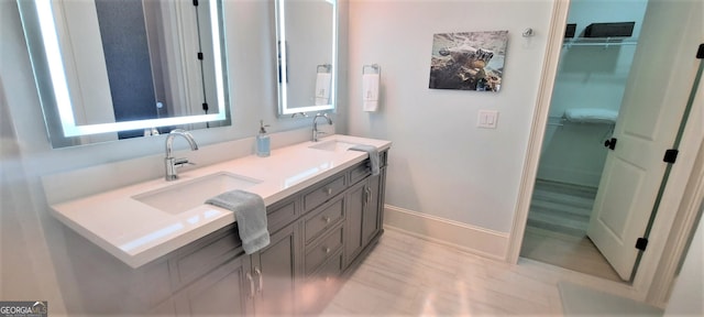 1330 Jackson Ridge Rd, Greensboro, GA 30642 - bathroom with double vanity and a walk in closet
