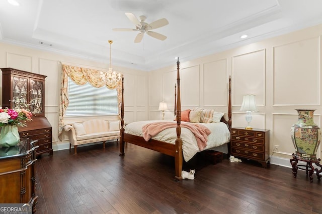 1413 N Walkers Mill Rd, Griffin, GA 30223 - bedroom featuring a decorative wall, a raised ceiling, dark wood-type flooring, ornamental molding, and recessed lighting