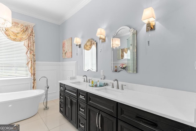 1413 N Walkers Mill Rd, Griffin, GA 30223 - full bath featuring double vanity, healthy amount of natural light, a freestanding bath, wainscoting, and ornamental molding