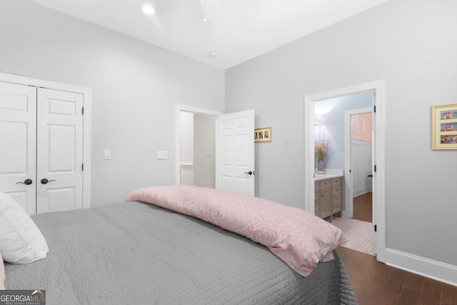 1413 N Walkers Mill Rd, Griffin, GA 30223 - bedroom with wood finished floors, a closet, and connected bathroom