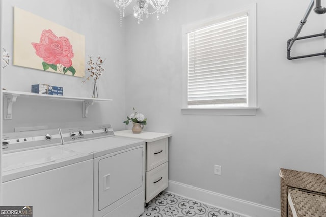 1413 N Walkers Mill Rd, Griffin, GA 30223 - laundry room with separate washer and dryer and a chandelier