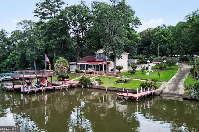 106 Oak Ln, Eatonton, GA 31024 - back of house with a water view and a yard