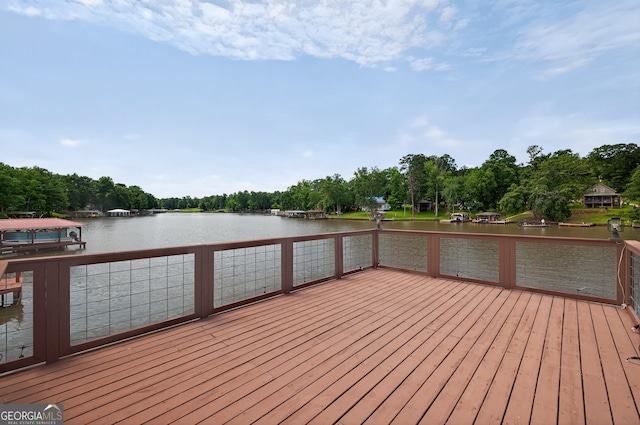 106 Oak Ln, Eatonton, GA 31024 - dock with view of wooded area and a deck with water view