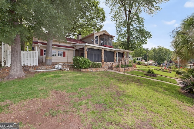 106 Oak Ln, Eatonton, GA 31024 - view of front of house with a sunroom and a chimney