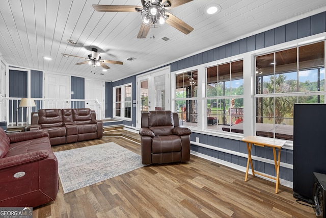 106 Oak Ln, Eatonton, GA 31024 - living area featuring a ceiling fan, a decorative wall, healthy amount of natural light, wood finished floors, and recessed lighting