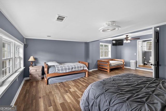 106 Oak Ln, Eatonton, GA 31024 - bedroom with crown molding, wood finished floors, and a ceiling fan