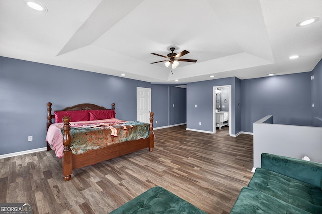 106 Oak Ln, Eatonton, GA 31024 - bedroom with a raised ceiling, wood finished floors, ceiling fan, and recessed lighting