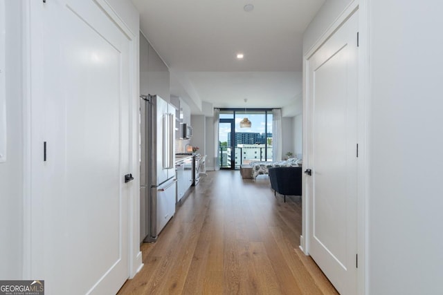 788 W Marietta St NW Unit 212, Atlanta, GA 30318 - hallway with light wood-type flooring and recessed lighting