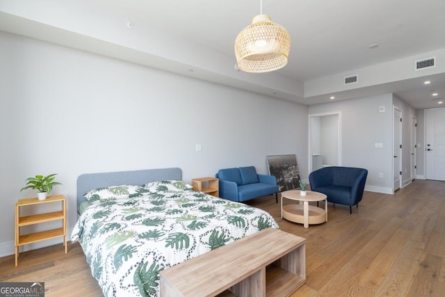 788 W Marietta St NW Unit 212, Atlanta, GA 30318 - bedroom featuring light wood-type flooring and recessed lighting