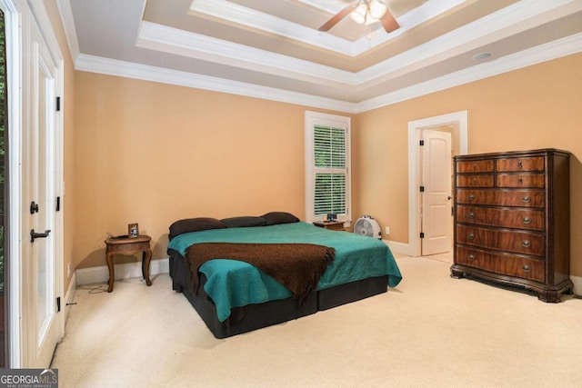 287 Scenic Falls Blvd, Hoschton, GA 30548 - bedroom with carpet, a tray ceiling, ornamental molding, and ceiling fan