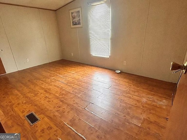 1004 Gordon Ave, Mcrae-Helena, GA 31037 - empty room with hardwood / wood-style floors