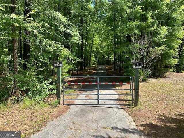 230 Vaughn Cir, Griffin, GA 30223 - gate with a view of trees