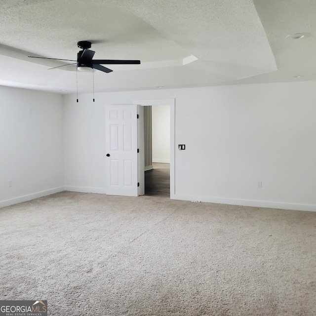 503 S Dooly St, Montezuma, GA 31063 - empty room with a ceiling fan, carpet flooring, and a textured ceiling