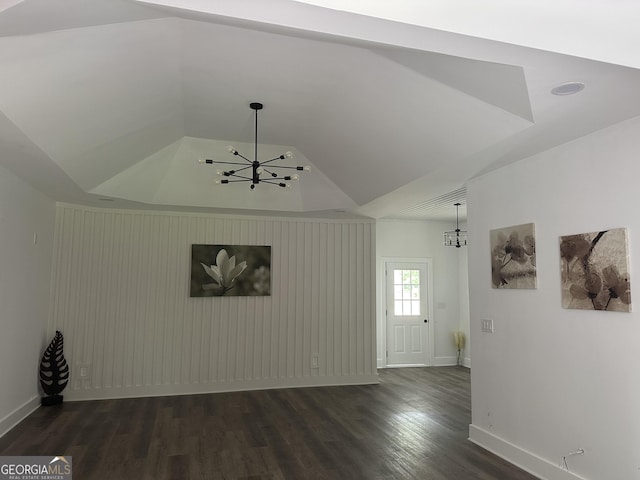 503 S Dooly St, Montezuma, GA 31063 - unfurnished living room with a chandelier and dark wood-style flooring