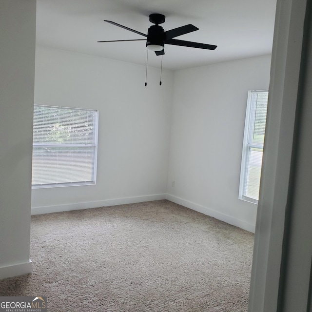 503 S Dooly St, Montezuma, GA 31063 - unfurnished room with carpet flooring and ceiling fan