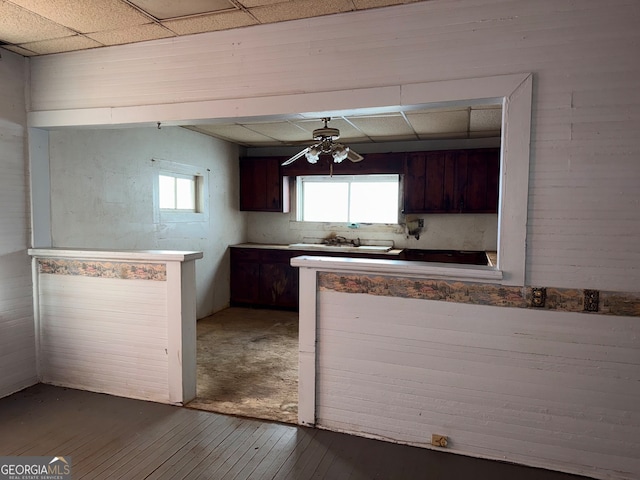 104 W Mauldin St, Walhalla, SC 29691 - kitchen with hardwood / wood-style floors, dark brown cabinetry, a paneled ceiling, and healthy amount of natural light
