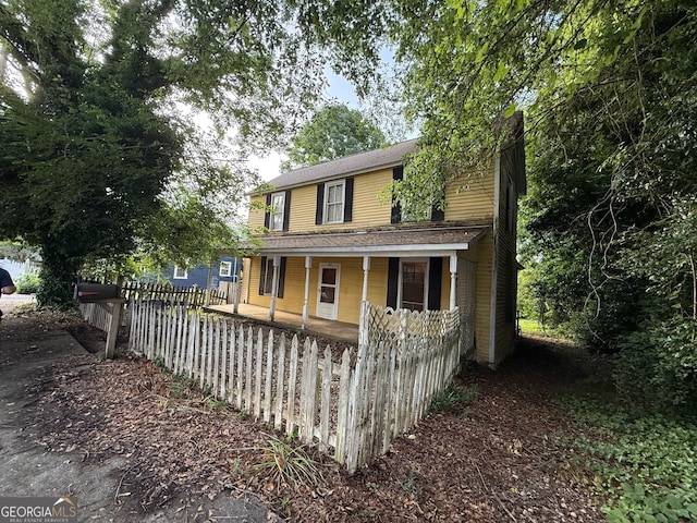 104 W Mauldin St, Walhalla, SC 29691 - view of front of house featuring covered porch and roof with shingles