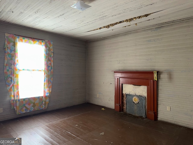 104 W Mauldin St, Walhalla, SC 29691 - unfurnished living room with hardwood / wood-style flooring and a fireplace with flush hearth