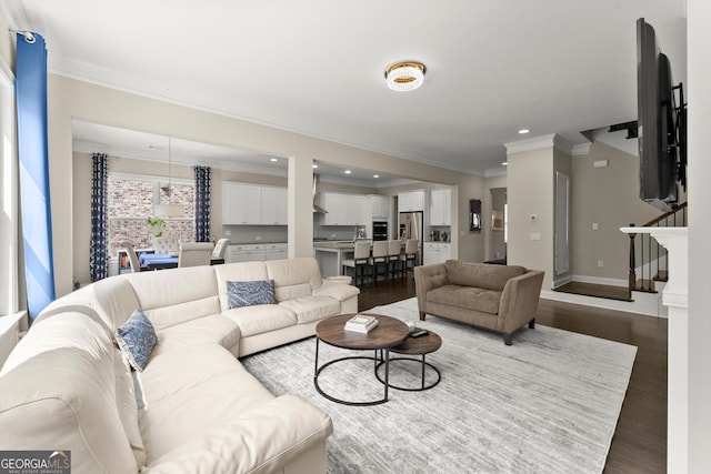 4130 Millbrook Ct, Suwanee, GA 30024 - living area with ornamental molding, wood finished floors, and recessed lighting