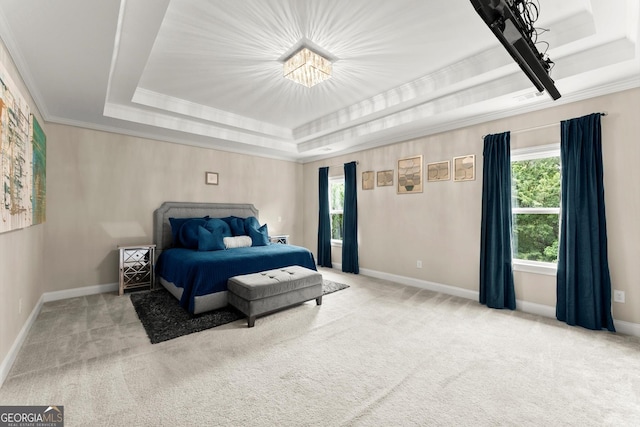 4130 Millbrook Ct, Suwanee, GA 30024 - carpeted bedroom featuring a tray ceiling, ornamental molding, and a chandelier