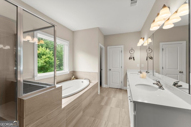 4130 Millbrook Ct, Suwanee, GA 30024 - bathroom with double vanity, a bath, and a tile shower