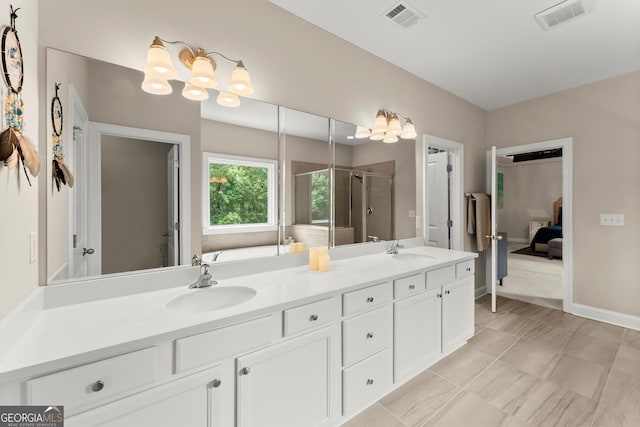 4130 Millbrook Ct, Suwanee, GA 30024 - ensuite bathroom featuring a stall shower, double vanity, and a bath
