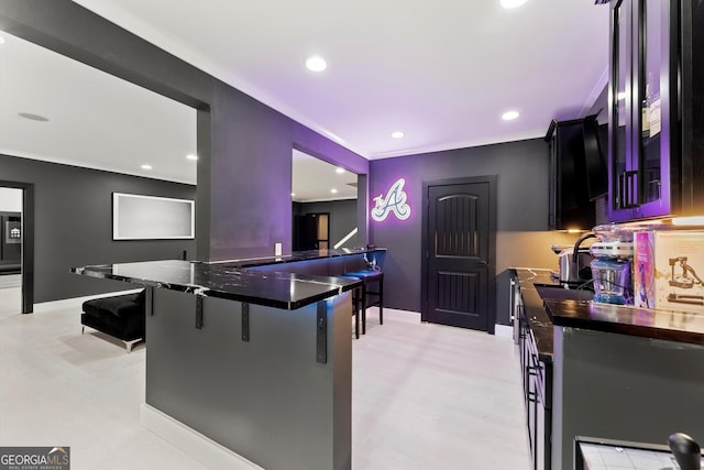 4130 Millbrook Ct, Suwanee, GA 30024 - kitchen featuring a kitchen bar, ornamental molding, and recessed lighting