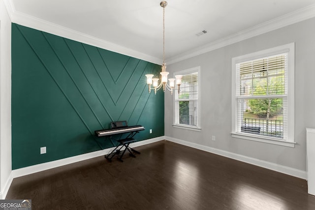 4130 Millbrook Ct, Suwanee, GA 30024 - spare room featuring a chandelier, dark wood-style flooring, and crown molding
