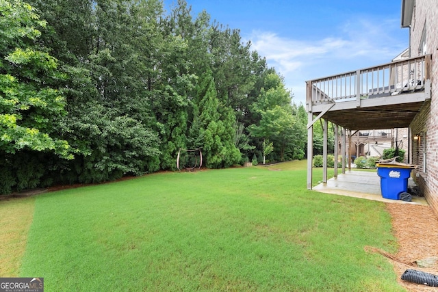 4130 Millbrook Ct, Suwanee, GA 30024 - view of green lawn with a deck