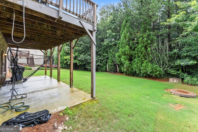 4130 Millbrook Ct, Suwanee, GA 30024 - view of yard featuring a patio area, an outdoor fire pit, and a deck