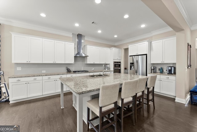 4130 Millbrook Ct, Suwanee, GA 30024 - kitchen featuring wall chimney exhaust hood, appliances with stainless steel finishes, a breakfast bar, an island with sink, and backsplash