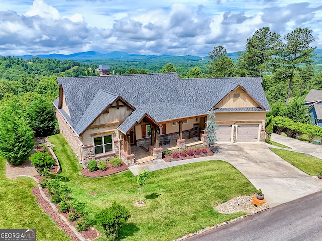 899 Ridge Pointe Way, Blairsville, GA 30512 - craftsman-style home featuring stone siding, a porch, board and batten siding, concrete driveway, and a front lawn