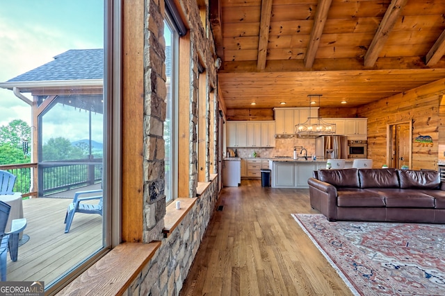 899 Ridge Pointe Way, Blairsville, GA 30512 - living room with wood ceiling, light wood-style floors, and a chandelier