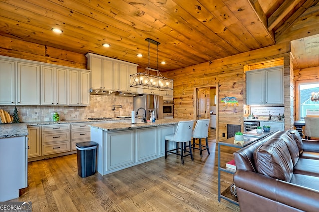 899 Ridge Pointe Way, Blairsville, GA 30512 - kitchen featuring appliances with stainless steel finishes, light wood-type flooring, wooden ceiling, tasteful backsplash, and a chandelier