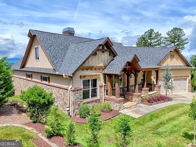 899 Ridge Pointe Way, Blairsville, GA 30512 - view of front of home with board and batten siding, stone siding, a shingled roof, and a chimney
