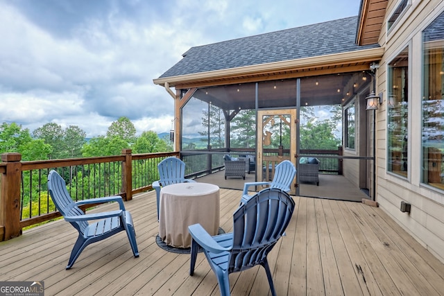 899 Ridge Pointe Way, Blairsville, GA 30512 - wooden deck featuring a sunroom and an outdoor hangout area