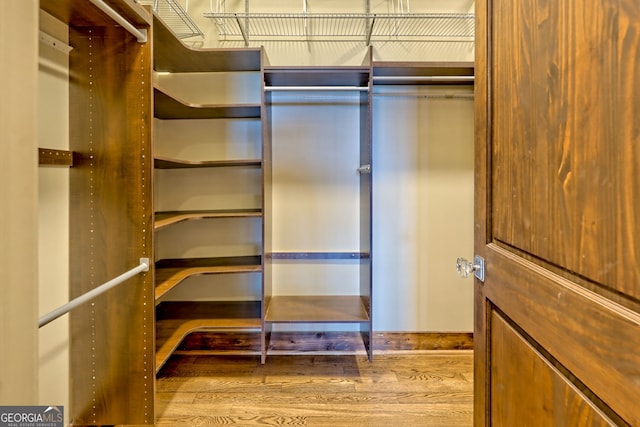 899 Ridge Pointe Way, Blairsville, GA 30512 - spacious closet with wood finished floors