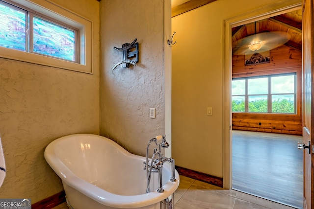 899 Ridge Pointe Way, Blairsville, GA 30512 - bathroom featuring a freestanding bath and tile patterned floors
