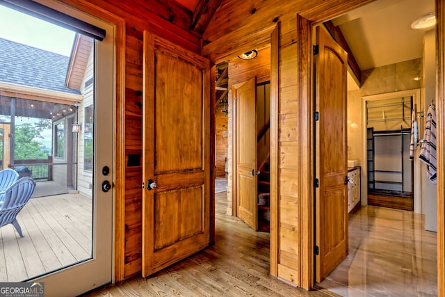899 Ridge Pointe Way, Blairsville, GA 30512 - corridor with wooden walls and light wood finished floors