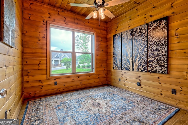 899 Ridge Pointe Way, Blairsville, GA 30512 - empty room with wooden ceiling, ceiling fan, and wooden walls