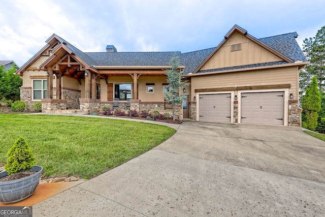 899 Ridge Pointe Way, Blairsville, GA 30512 - craftsman-style house with stone siding, a front yard, and concrete driveway